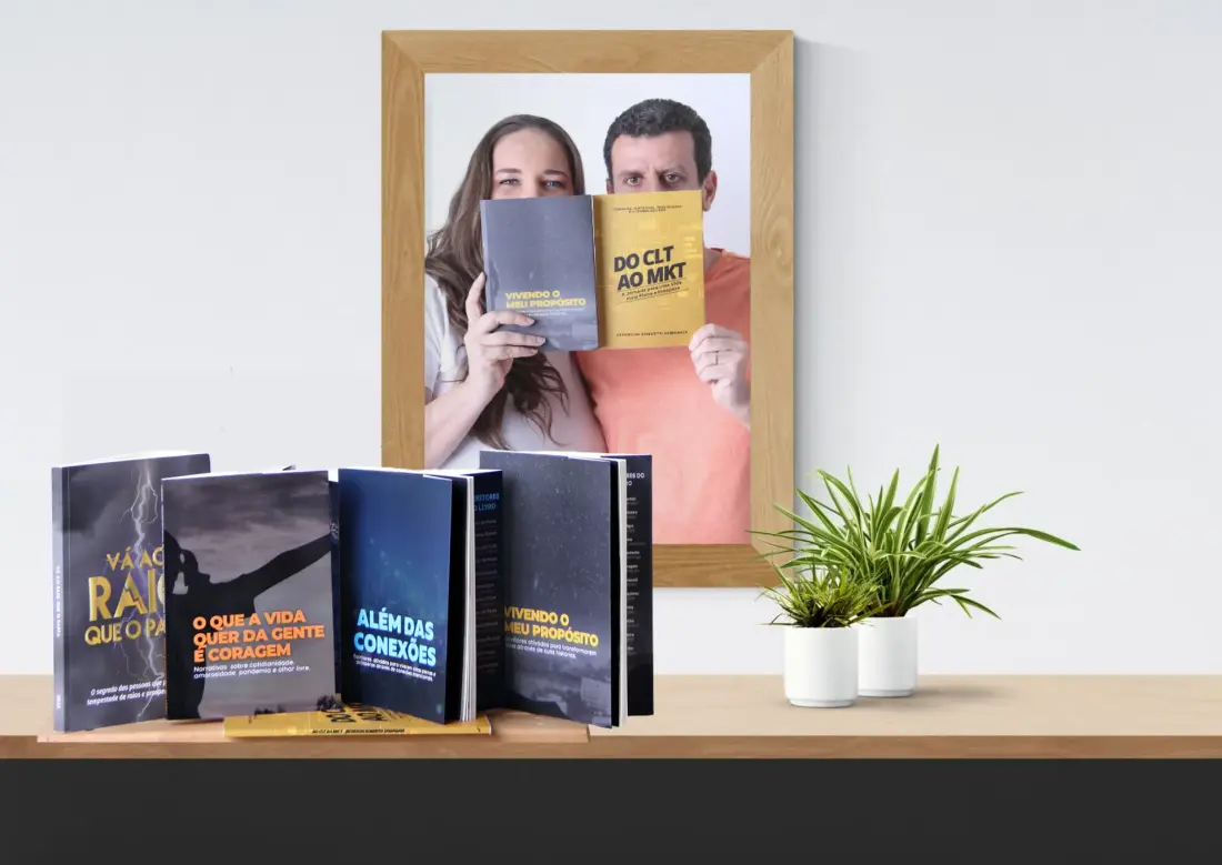 Jeff e Gisele, fundadores da Editora NPE, segurando livros publicados pela editora